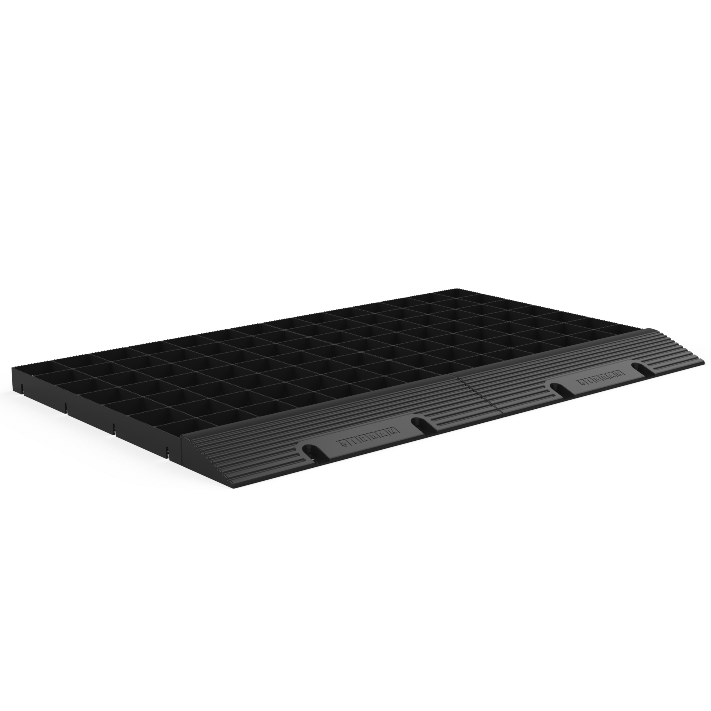 Rampe pour grilles à gravier installée pour un stationnement temporaire